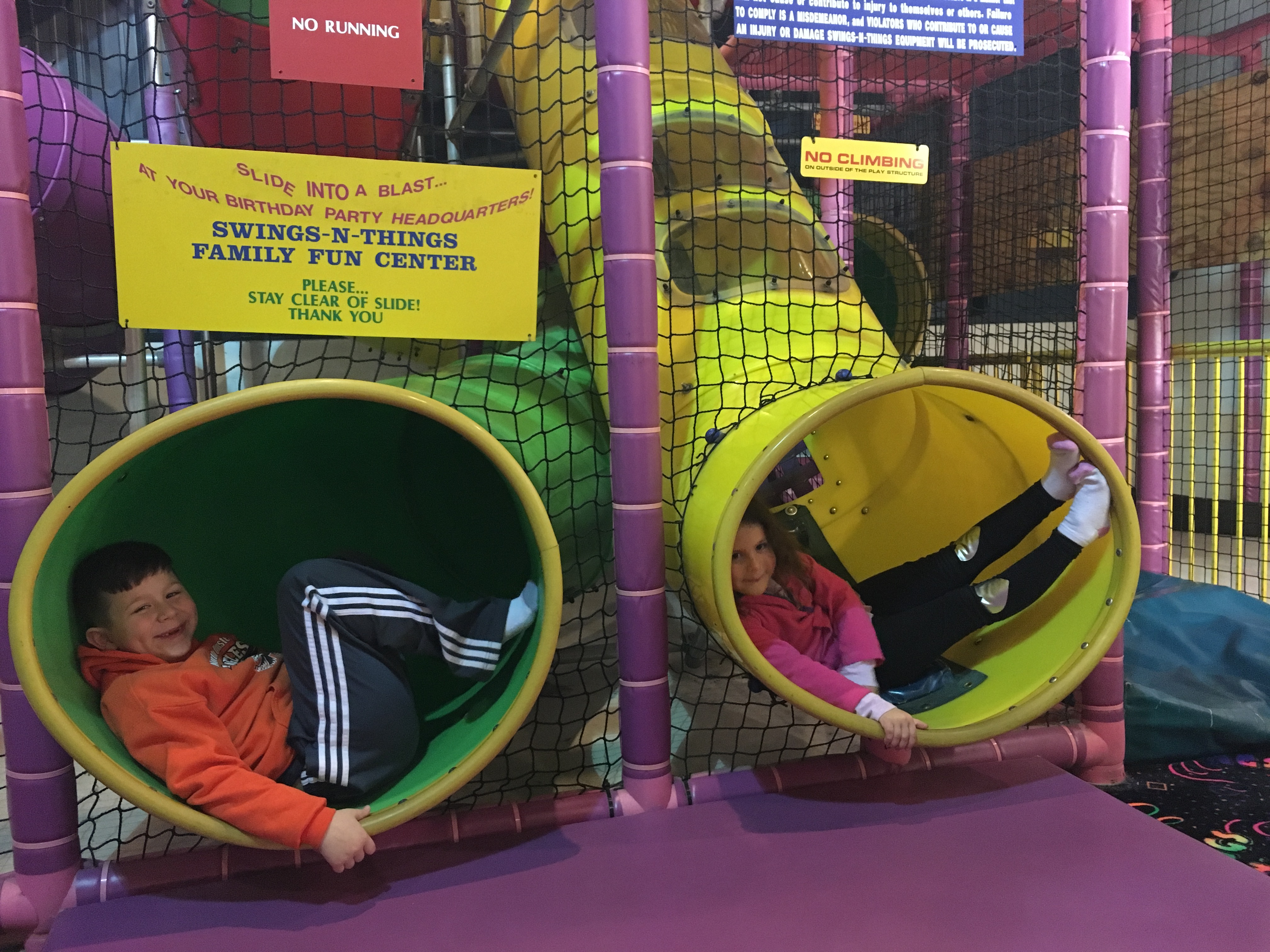 boy and girl in tubes